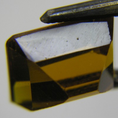 orange citrine uneven facet.jpg